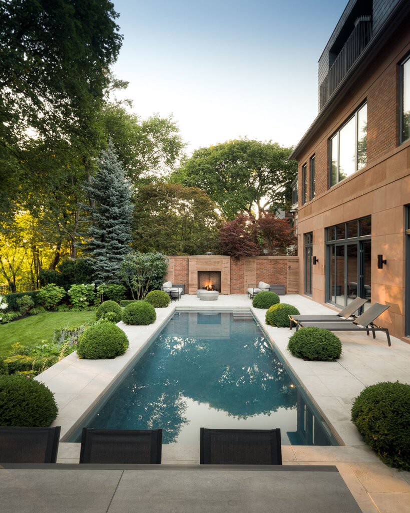 Elegant Pool Design with Outdoor Fireplace
