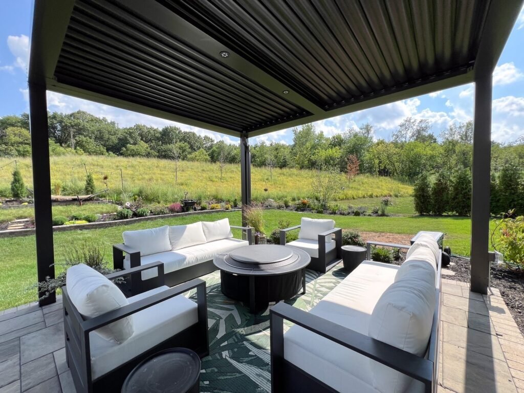 Contemporary Louvered Pergola with Meadow Views