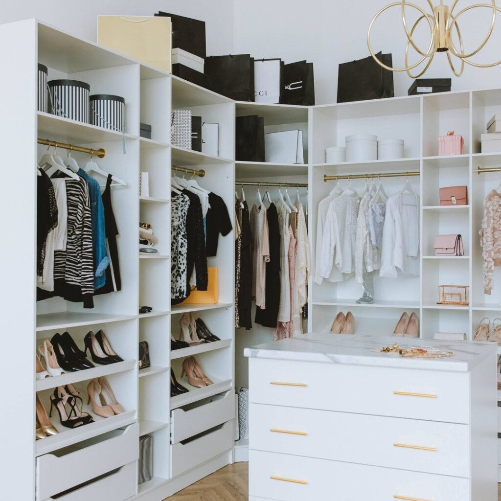 Closet By Design Walk In with Island Storage